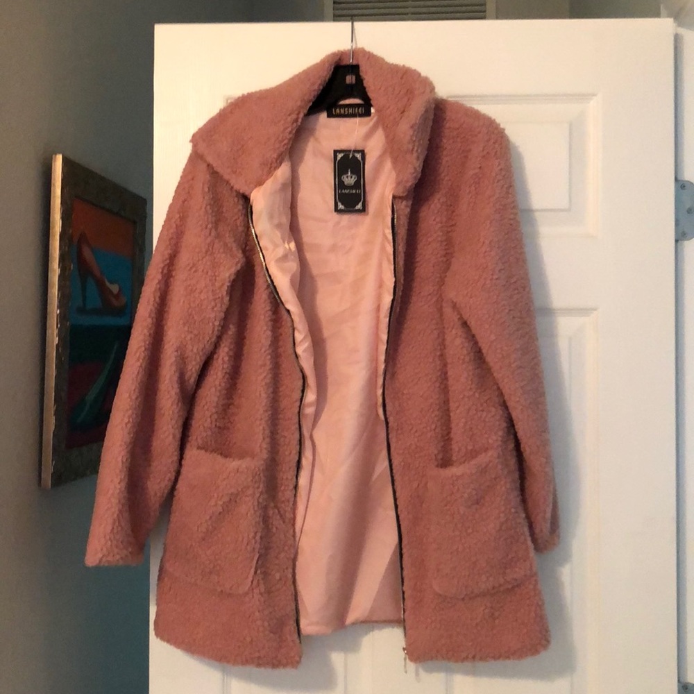 A light pink statement jacket